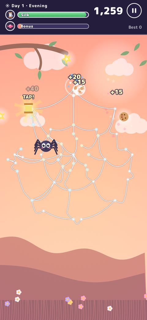Play screen in the evening: a large web strung from a tree branch, with the score at the top