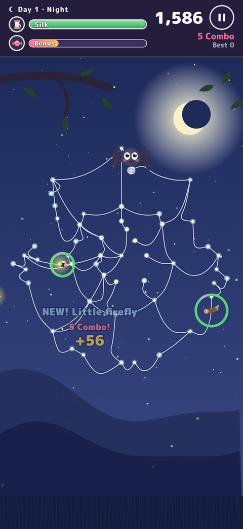 Play screen at night: the web shines white under the moon